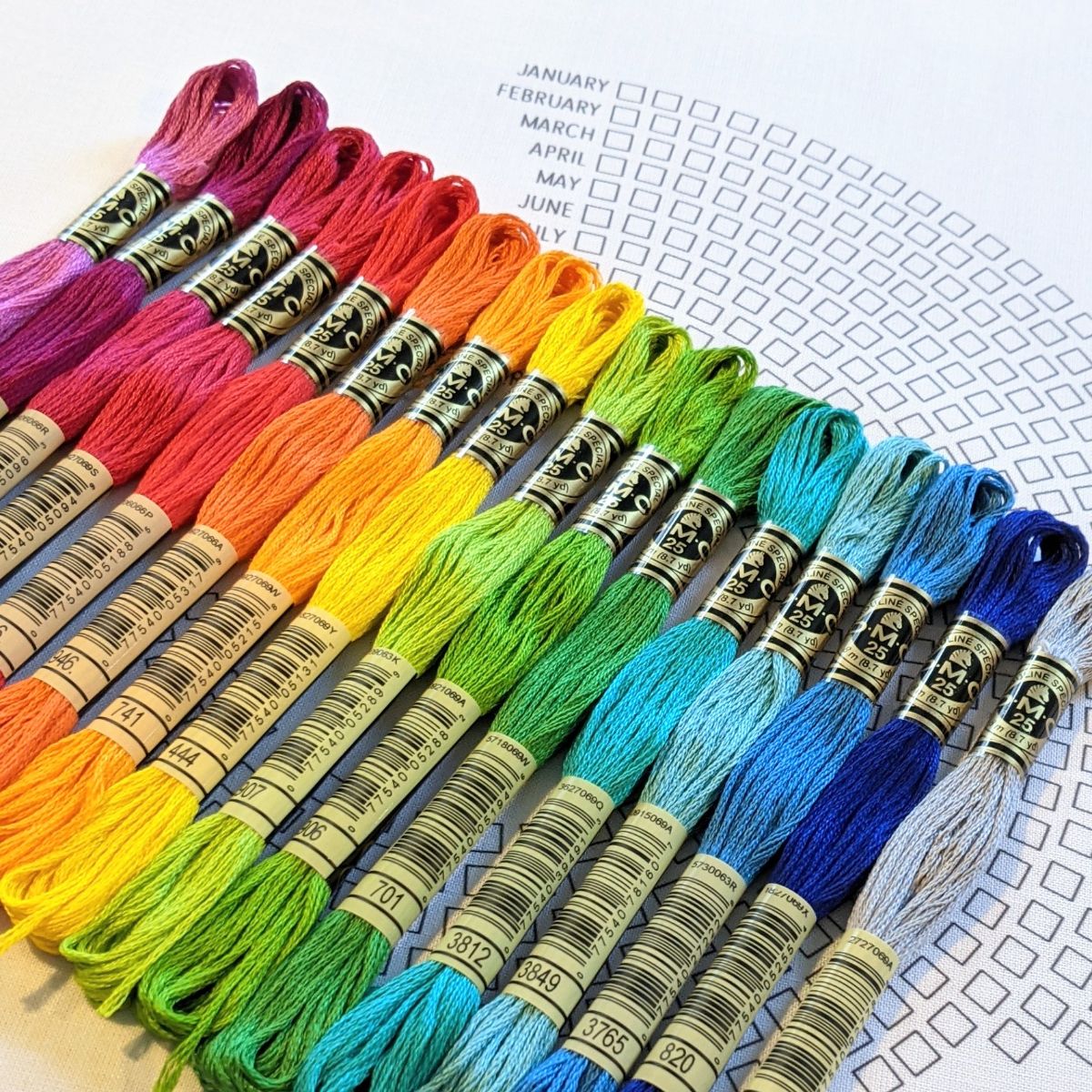 A rainbow oof 16 shades of embroidery thread